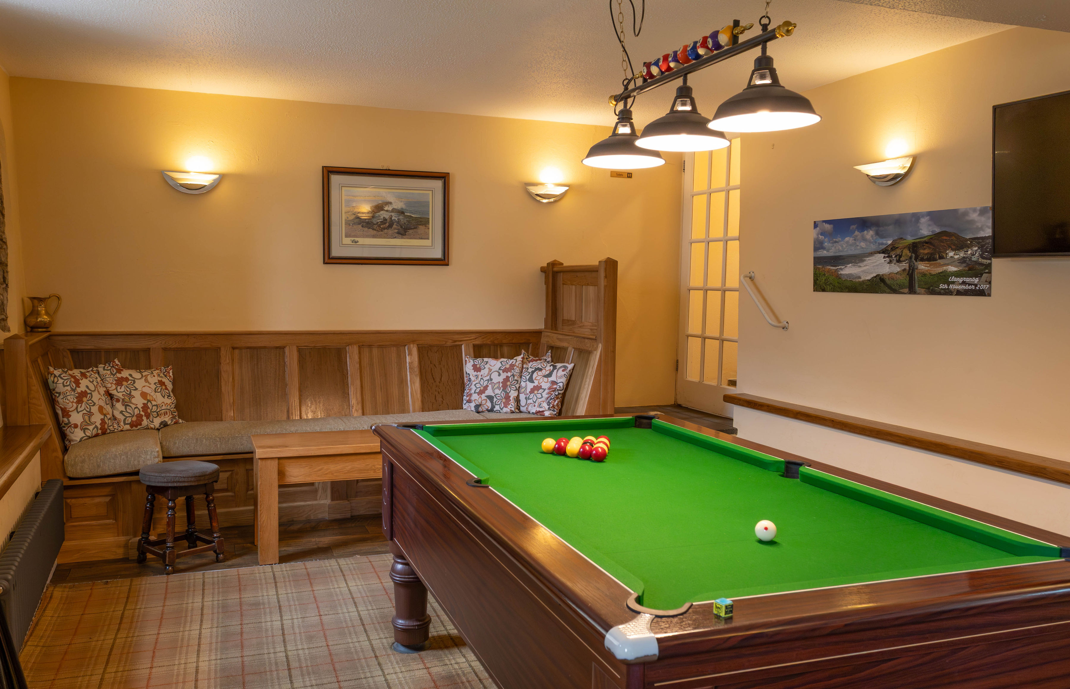 Games room and relaxed pub spaces at the Pentre Arms
